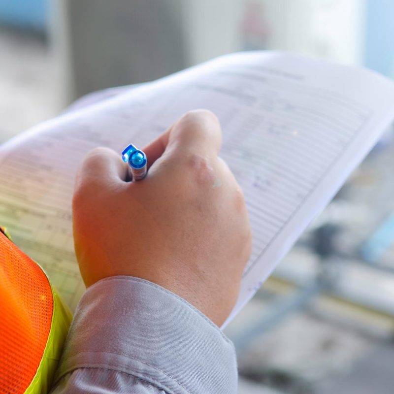 engineer write maintenance inspection check list ,record data for preventive maintenance,hand write data on check sheet.